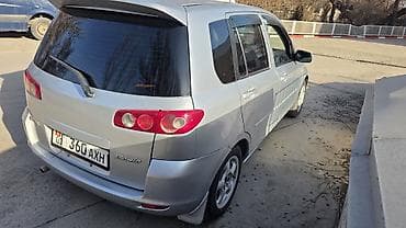 рассрочку автомобиль: Mazda Demio: 2004 г., 1.3 л, Бензин — 5