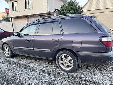 Продажа авто: Mazda Capella: 1998 г., 2 л, Механика, Бензин, Универсал — 7