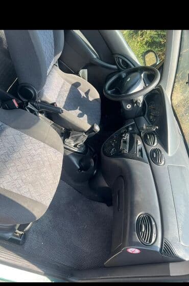 бу машина: Ford Focus: 2001 г., 1.6 л, Механика, Бензин, Универсал — 8