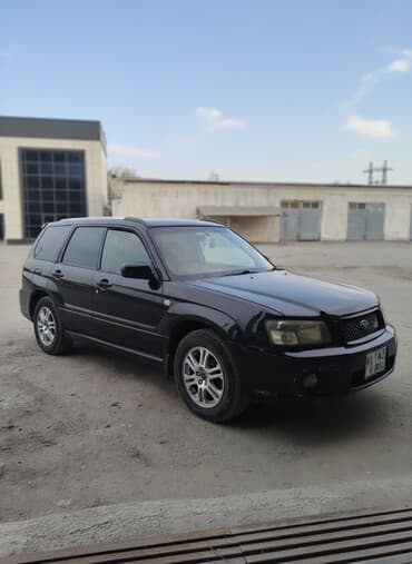 диск на форестер: Subaru Forester: 2004 г., 2 л, Автомат, Бензиновая, Кроссовер — 1
