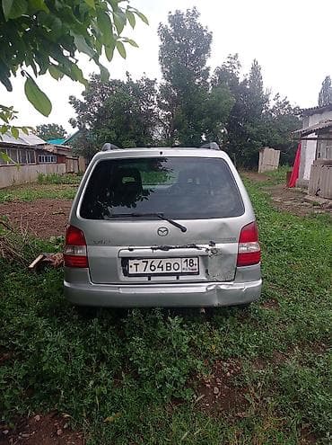 сктер: Mazda Demio: 1998 г., 1.3 л, Автомат, Бензин, Универсал — 1