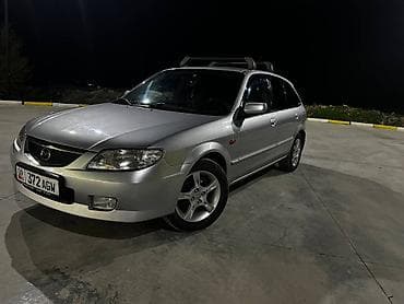step rf3: Mazda 323: 2003 г., 1.6 л, Ручные, Бензин, Универсал — 4