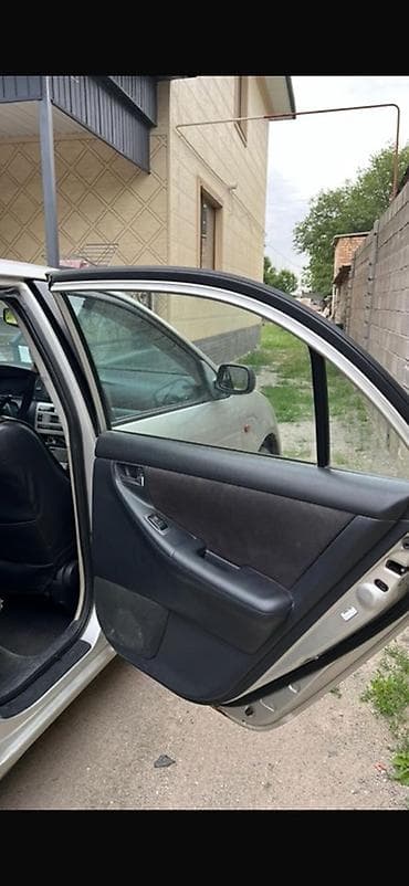 Toyota Corolla: 2004 г., 1.4 л, Автомат, Бензин, Седан