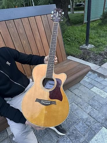 сустейн: Акустическая гитара с вырезом (cutaway), корпус типа джамбо — 3