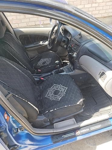 zimmer e9 pro: Nissan Almera: 2001 г., Ручные, Бензин, Хэтчбэк — 5