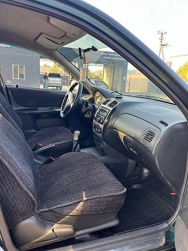 2 4 д: Mazda 323: 2000 г., 2 л, Механика, Бензин, Хэтчбэк — 8