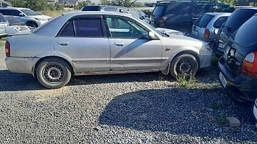 mazda 626 кронос: Mazda Familia: 2002 г., 1.6 л, Автомат, Бензин, Седан — 5