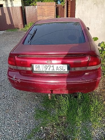 гитара мазда: Mazda Cronos: 1993 г., Лифтбек — 4