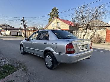 launch 431: Mazda 323: 2003 г., 1.6 л, Механика, Бензин, Седан — 3