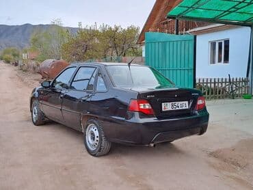 машину в рассрочку без банка: Daewoo Nexia: 2010 г., 1.5 л, Механика, Бензин, Седан — 3