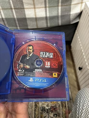 games: Игра Red Dead Redemption II для PlayStation 4 (версия на дисках — 3