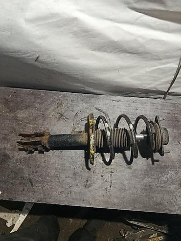 office 2013: Передний амортизатор Hyundai 2009 г., Оригинал — 2