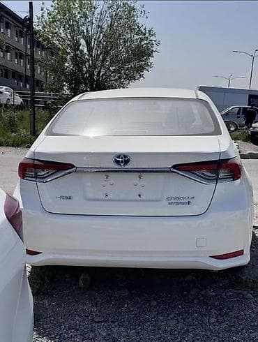 corolla 2004: Toyota Corolla: 2021 г., 1.8 л, Вариатор, Гибрид, Седан — 4