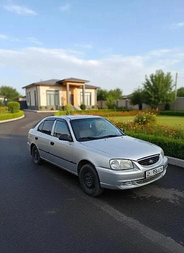 lancer evo: Седан серебристого цвета, компактный и экономичный. Кузов 4‑дверный — 1