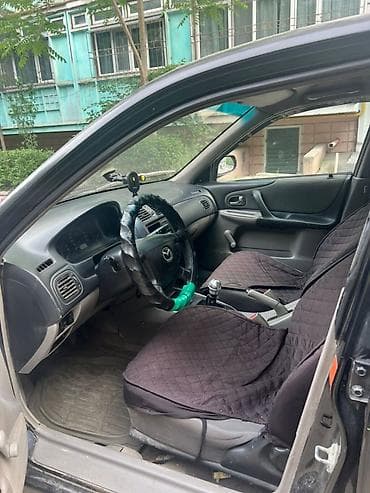 на мазда 323f: Mazda 323: 2002 г., 1.3 л, Механика, Бензин, Хэтчбэк — 2