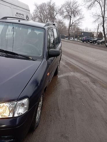 новое авто: Mazda Demio: 2002 г., 1.3 л, Механика, Бензин, Хэтчбэк — 5