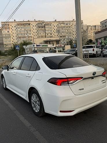 892 2: Toyota Corolla: 2023 г., 1.8 л, Автомат, Гибрид, Седан — 4