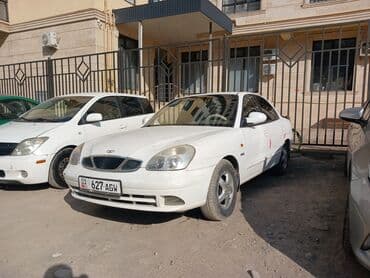 полик нексия 2: Daewoo Nubira: 1999 г., Механика, Седан — 4