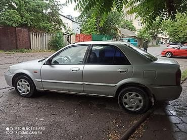 Mazda: Mazda Familia: 2002 г., 1.6 л, Механика, Бензин, Седан — 3