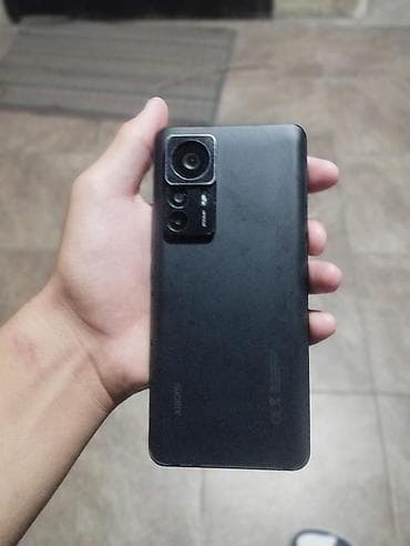 redmi 5 note: Смартфон Xiaomi (линейка 12/12T, черный матовый корпус) - Тонкий — 1
