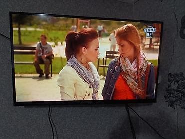 ТВ и видео: LED-телевизор с тонкими рамками, настенное крепление - Диагональ — 1