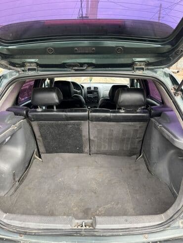 Паркет: Mazda 323: 1999 г., 1.5 л, Механика, Бензин, Хэтчбэк — 4