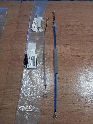 Трос печки на LANCER Новый, оригинал. В наличии большой ассортимент