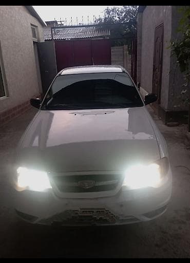тез арада: Daewoo Nexia: 2009 г., 1.6 л, Кол менен иштөөчү, Бензин, Седан — 4