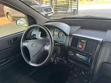 сктер: Hyundai Getz: 2008 г., 1.4 л, Кол менен иштөөчү, Бензин, Хетчбек — 9