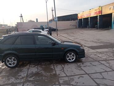 купить держатель номера на авто: Mazda 323: 2003 г., 1.6 л, Механика, Бензин, Хэтчбэк — 3