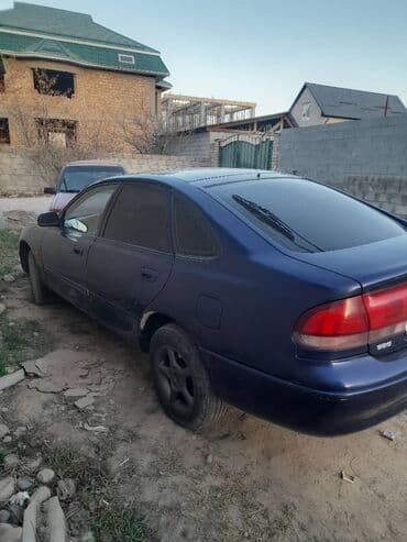 продаю в связи переездом: Mazda 626: 1996 г., 1.8 л, Механика, Бензиновая, Хэтчбэк — 4