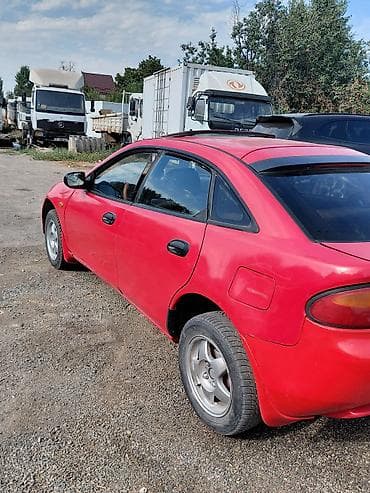 тканевый: Mazda Lantis: 1997 г., 1.5 л, Механика, Бензин, Хэтчбэк — 4