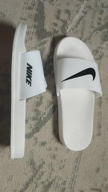 Шлепка NIKE
ПСЖ барсетка 
Спортивный очки 
Bytyn барсетка
