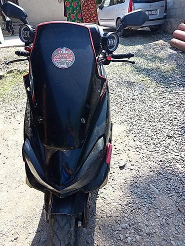 электро скутера: Скутер/макси-скутер 50–150 см³ (визуально — спортивный дизайн, черный — 2