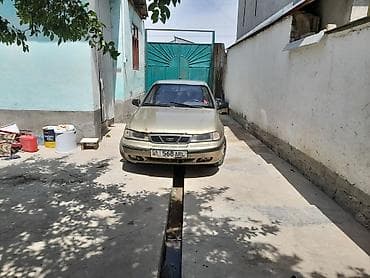 некия 2: Daewoo Nexia: 2005 г., Механика, Бензин, Седан — 3