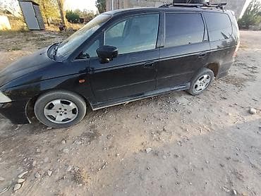 Honda Odyssey, правый руль, черный минивэн. Основные особенности: -