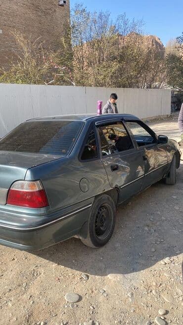 китайски машина: Daewoo Nexia: 1996 г., 1.5 л, Механика, Бензин, Седан — 2