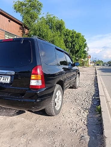 хендай тускани 2002: Mazda Tribute: 2002 г., 2 л, Автомат, Бензин, Внедорожник — 6
