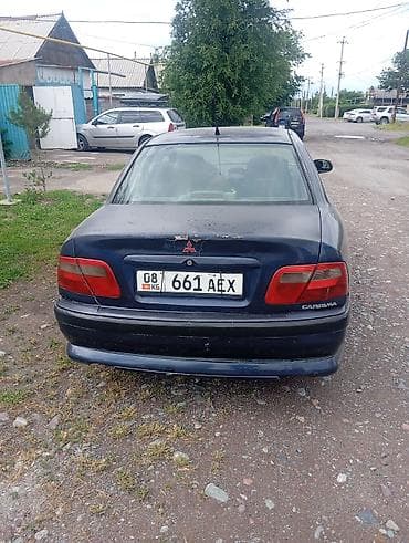 sorento 2019: Mitsubishi Carisma: 2002 г., Седан — 3
