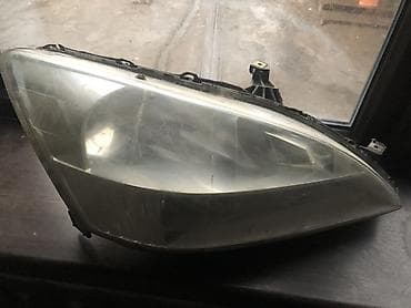 стекло фара: Передняя левая фара Ford — 1