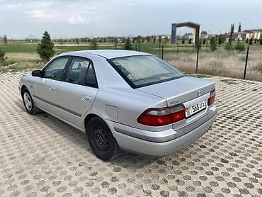 down pipe: Mazda 626: 1998 г., 2 л, Механика, Бензин, Седан — 6