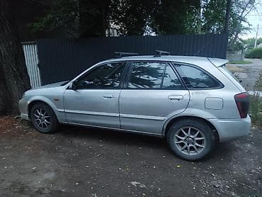 e2 byd: Mazda 323: 2002 г., 2 л, Автомат, Бензин, Хэтчбэк — 2