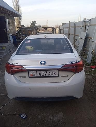 levin: Toyota Corolla: 2018 г., 1.8 л, Автомат, Гибрид, Седан — 2