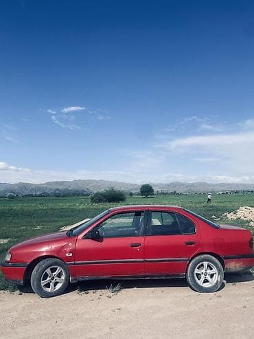 лабо газ: Nissan Primera: 1993 г., Механика, Бензин, Седан — 4