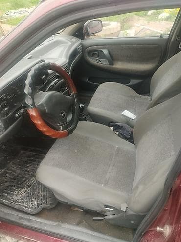 devo matiz: Daewoo Nexia: 2005 г., Механика, Бензин, Седан — 5