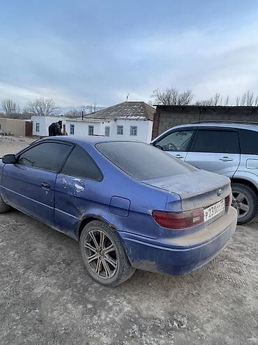 rd 1: Купе синего цвета с тонированными стеклами и спортивными дисками — 6