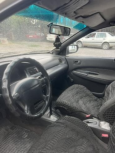 електро машина: Mazda 323: 1995 г., Седан — 5