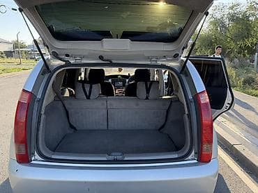 Toyota Raum: 2002 г., Автомат, Бензин, Минивэн — 7