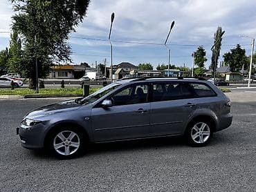 варианты: Mazda 6: 2005 г., 2 л, Механика, Газ, Универсал — 7