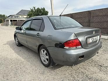 аудио усилитель: Mitsubishi Lancer: 2006 г., 1.6 л, Механика, Бензин, Седан — 5
